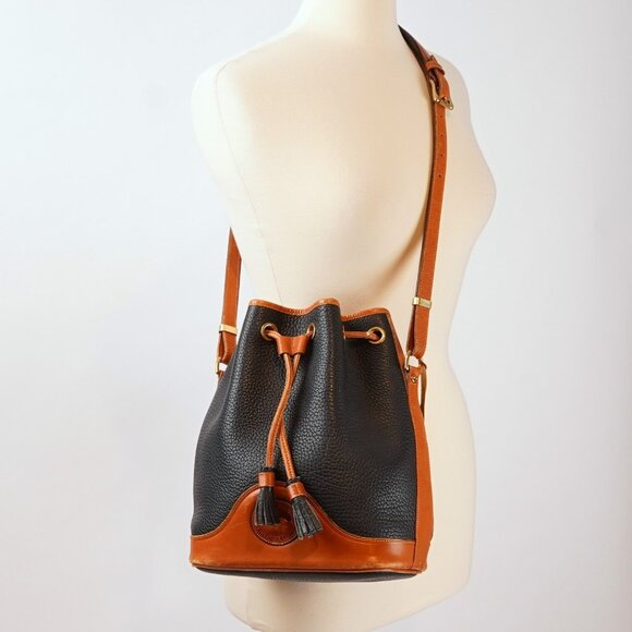 Dooney & Bourke Vintage Drawstring Bucket Bag Navy Brown Leather - Picture 1 of 11